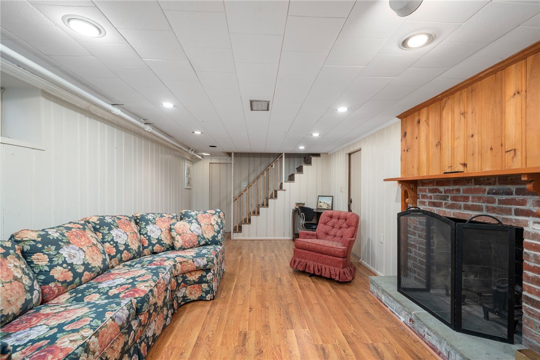 278 New Meadow Road Barrington, RI 02806 - Photo 22 of 26 Lower level finished room with fireplace