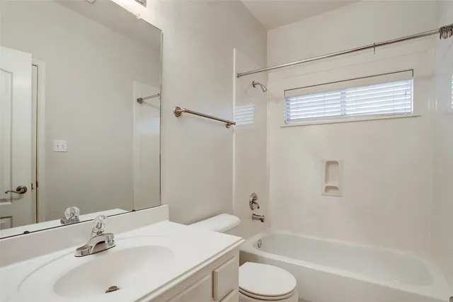 a bathroom with a sink toilet a shower and a bathtub