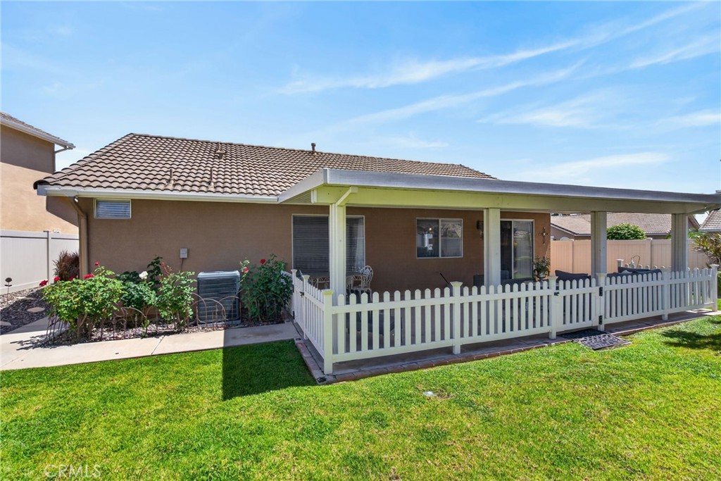 19584 Jill Court Riverside, CA 92508 - Photo 22 of 31 a front view of a house with a garden