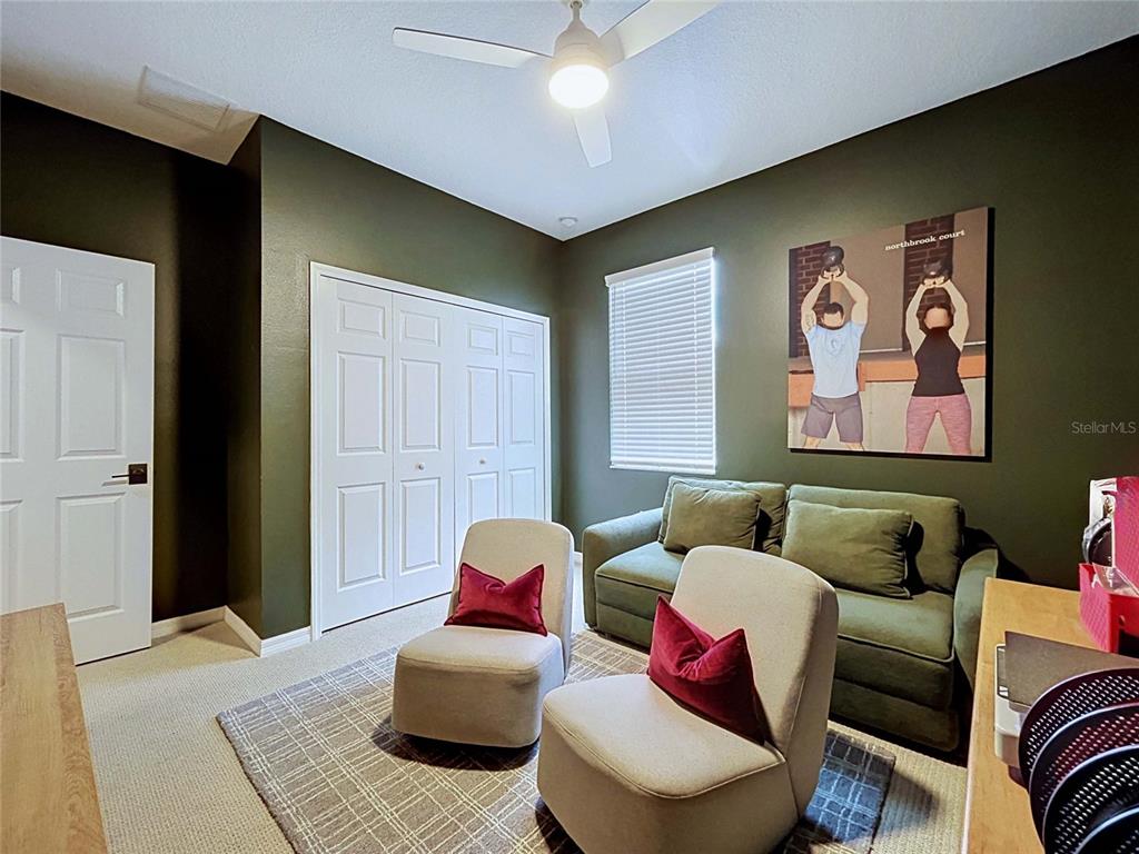 18078 Romanesque Court Spring Hill, FL 34610 - Photo 51 of 81 a living room with furniture and a rug
