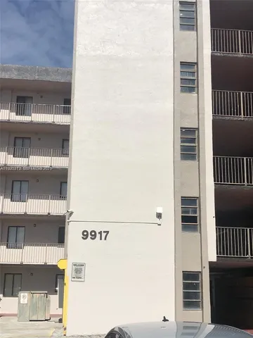 a view of a garage with car parked