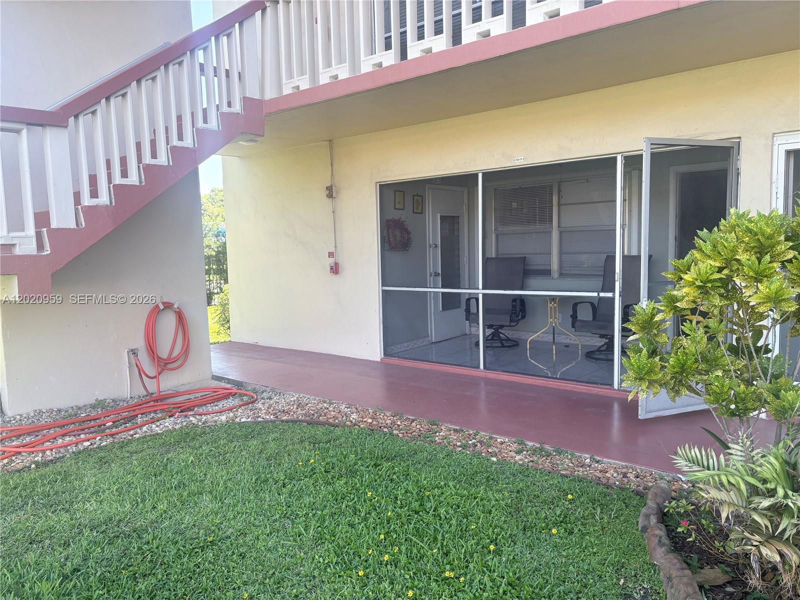 5300 Washington Street, Unit R101 Hollywood, FL 33021 - Photo 1 of 19 Corner, first floor unit, with screened porch.