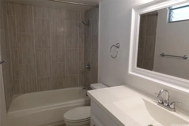 a bathroom with a sink toilet a shower and bathtub