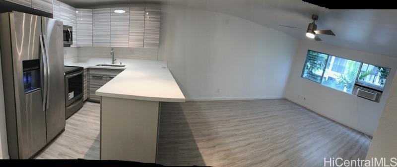 350 Aoloa Street, Unit A111 Kailua, HI 96734 - Photo 15 of 24 a kitchen with a refrigerator and a sink