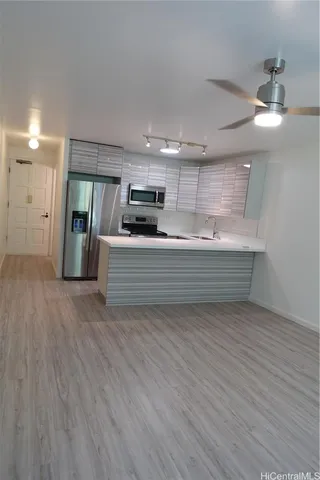 a bathroom with a double vanity sink and a large mirror
