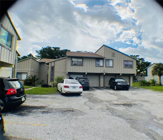 a house with trees in front of it