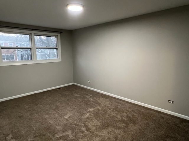 1010 Denham Place Schaumburg, IL 60169 - Photo 12 of 16 an empty room with a window