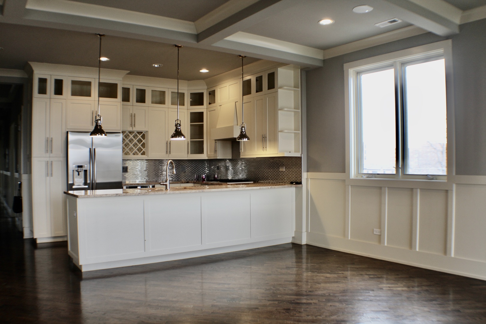 4029 South Ellis Avenue, Unit 5S Chicago, IL 60653 - Photo 5 of 31 a kitchen with stainless steel appliances granite countertop a stove a sink and a refrigerator