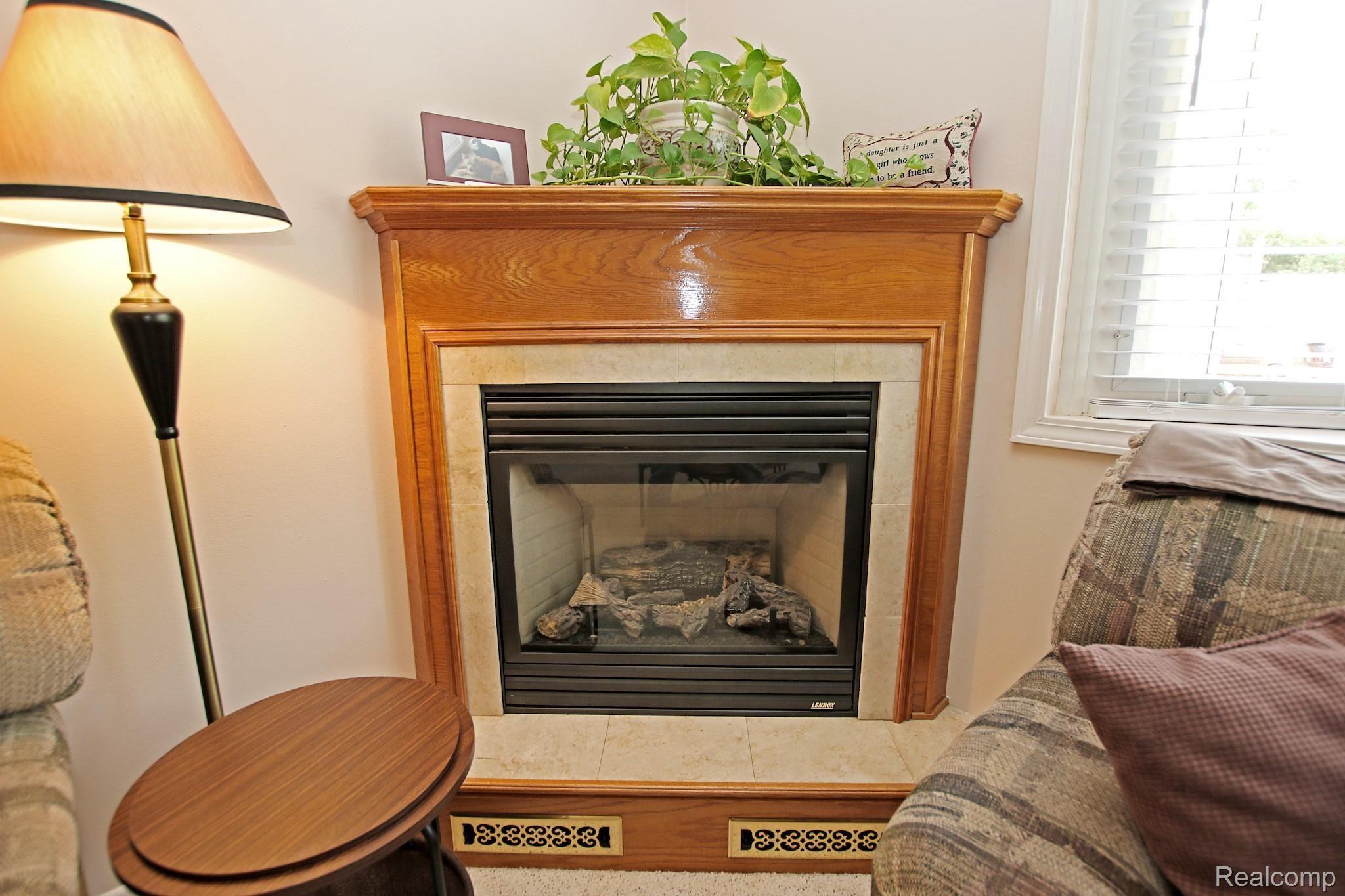 5825 Crescent Road Waterford, MI 48327 - Photo 6 of 44 6) Living Room Fireplace.jpg