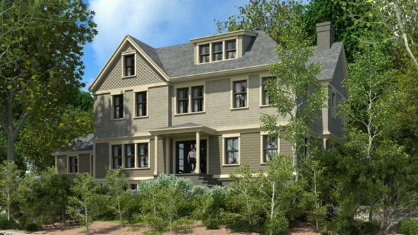 a front view of a house with a yard