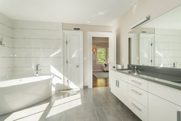 175 Coolidge Hill Road Cambridge, MA 02138 - Photo 11 of 25 a spacious bathroom with a granite countertop tub sink and mirror