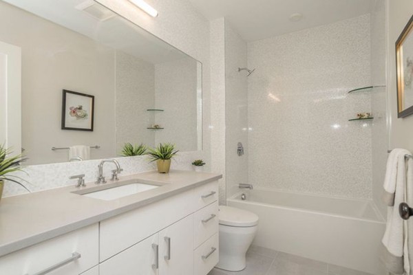 175 Coolidge Hill Road Cambridge, MA 02138 - Photo 13 of 25 a bathroom with a granite countertop sink a toilet and shower