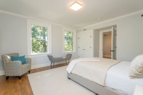 175 Coolidge Hill Road Cambridge, MA 02138 - Photo 15 of 25 a bedroom with a bed and a couch