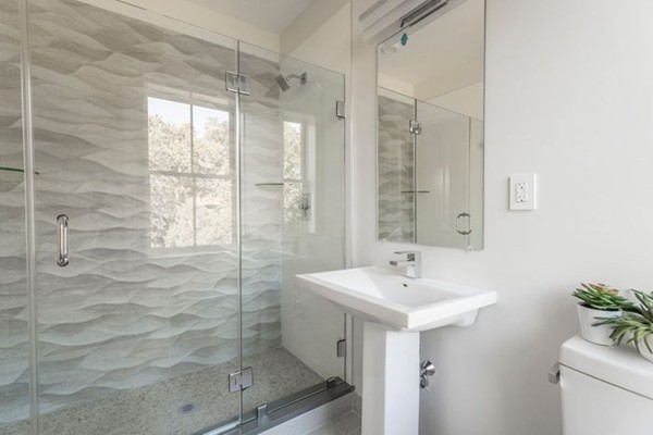 175 Coolidge Hill Road Cambridge, MA 02138 - Photo 17 of 25 a bathroom with a sink a toilet and shower