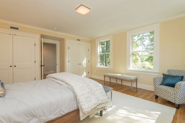 175 Coolidge Hill Road Cambridge, MA 02138 - Photo 19 of 25 a spacious bedroom with a bed and a large window
