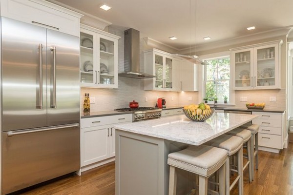 175 Coolidge Hill Road Cambridge, MA 02138 - Photo 8 of 25 a kitchen with stainless steel appliances granite countertop a sink stove and refrigerator