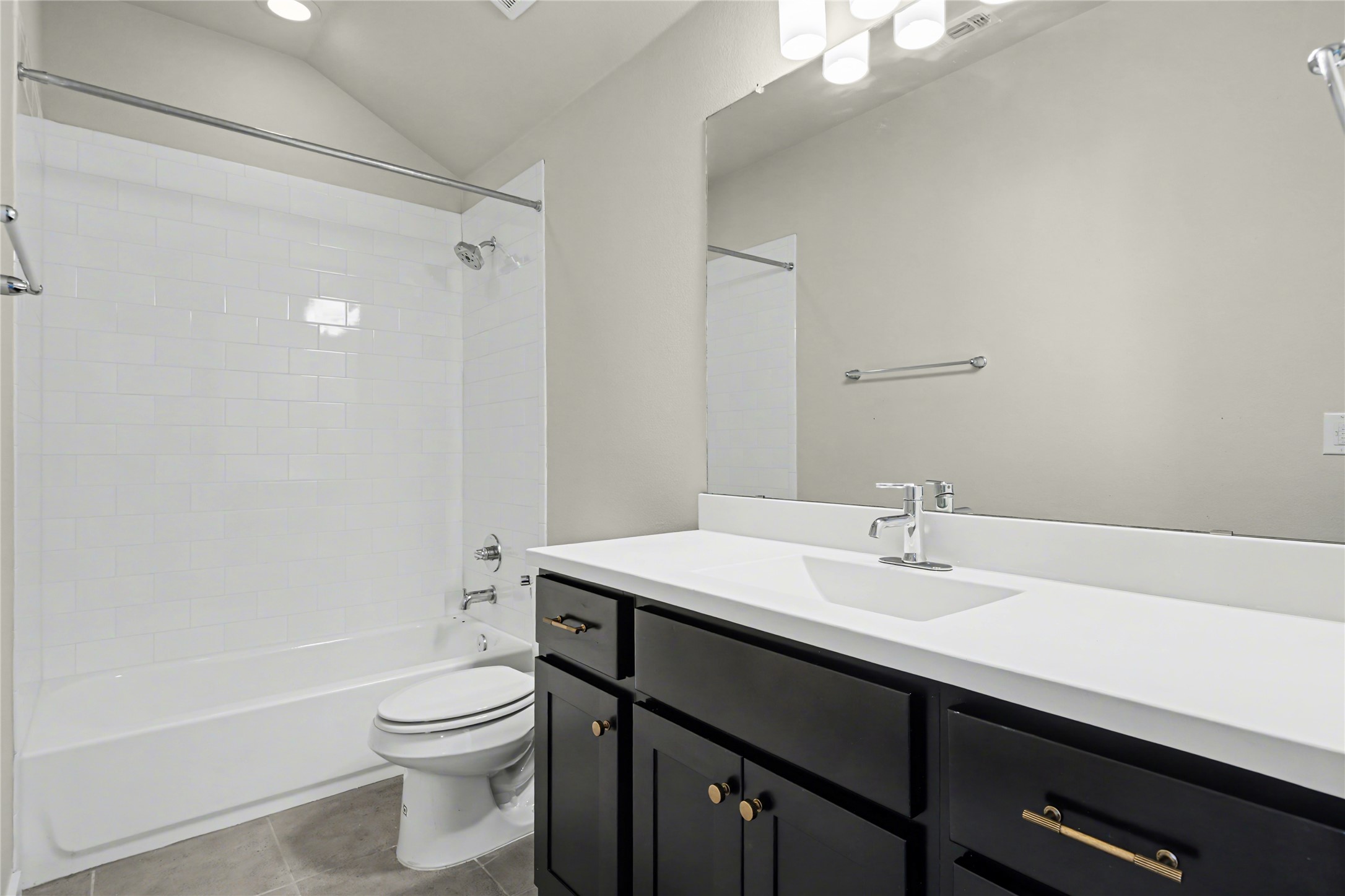 7216 Cherry Beam Path Austin, TX 78744 - Photo 25 of 32 a bathroom with a sink a toilet and shower