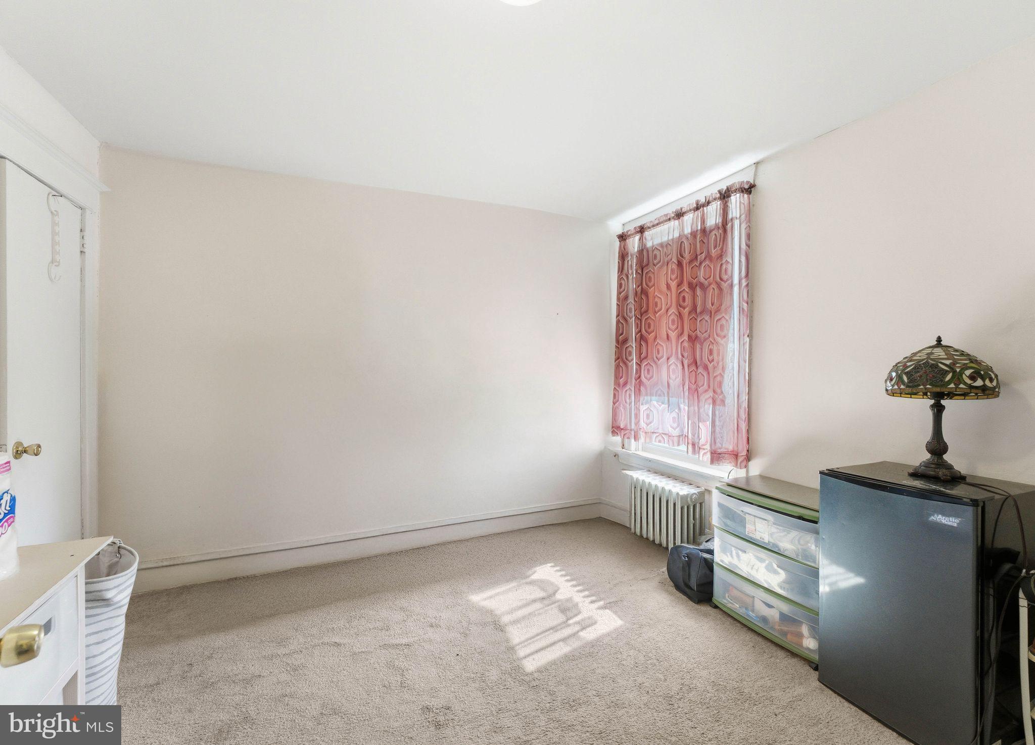 7828 Michener Avenue Philadelphia, PA 19150 - Photo 15 of 23 a view of an empty room with a window