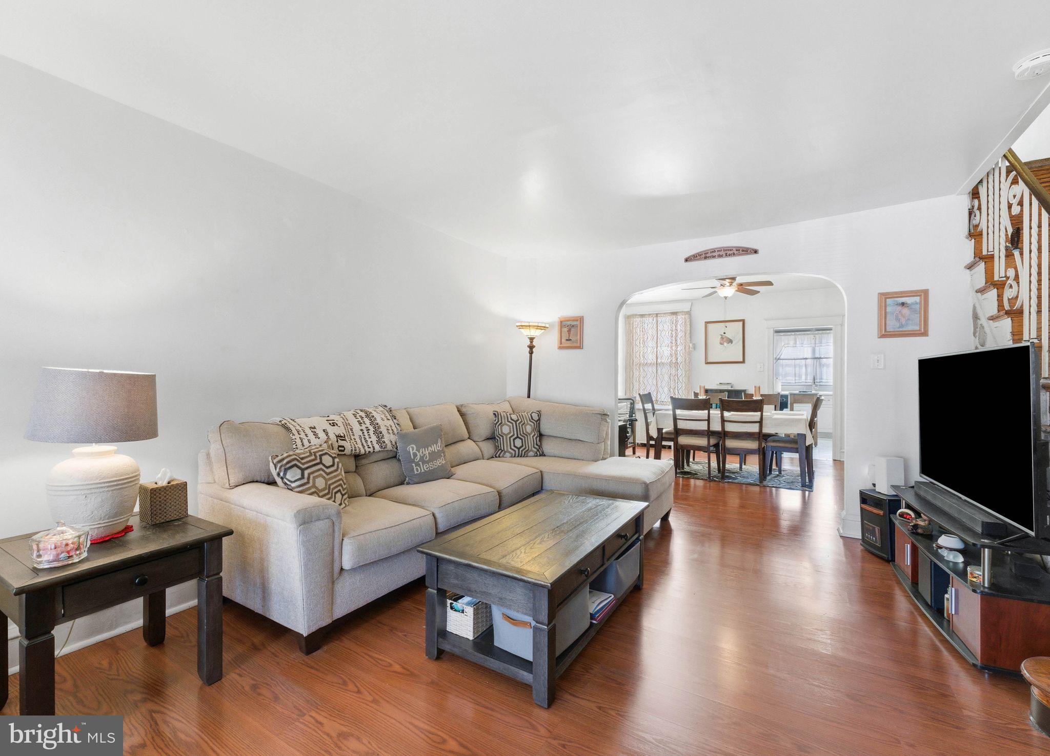 7828 Michener Avenue Philadelphia, PA 19150 - Photo 3 of 23 a living room with furniture and a flat screen tv