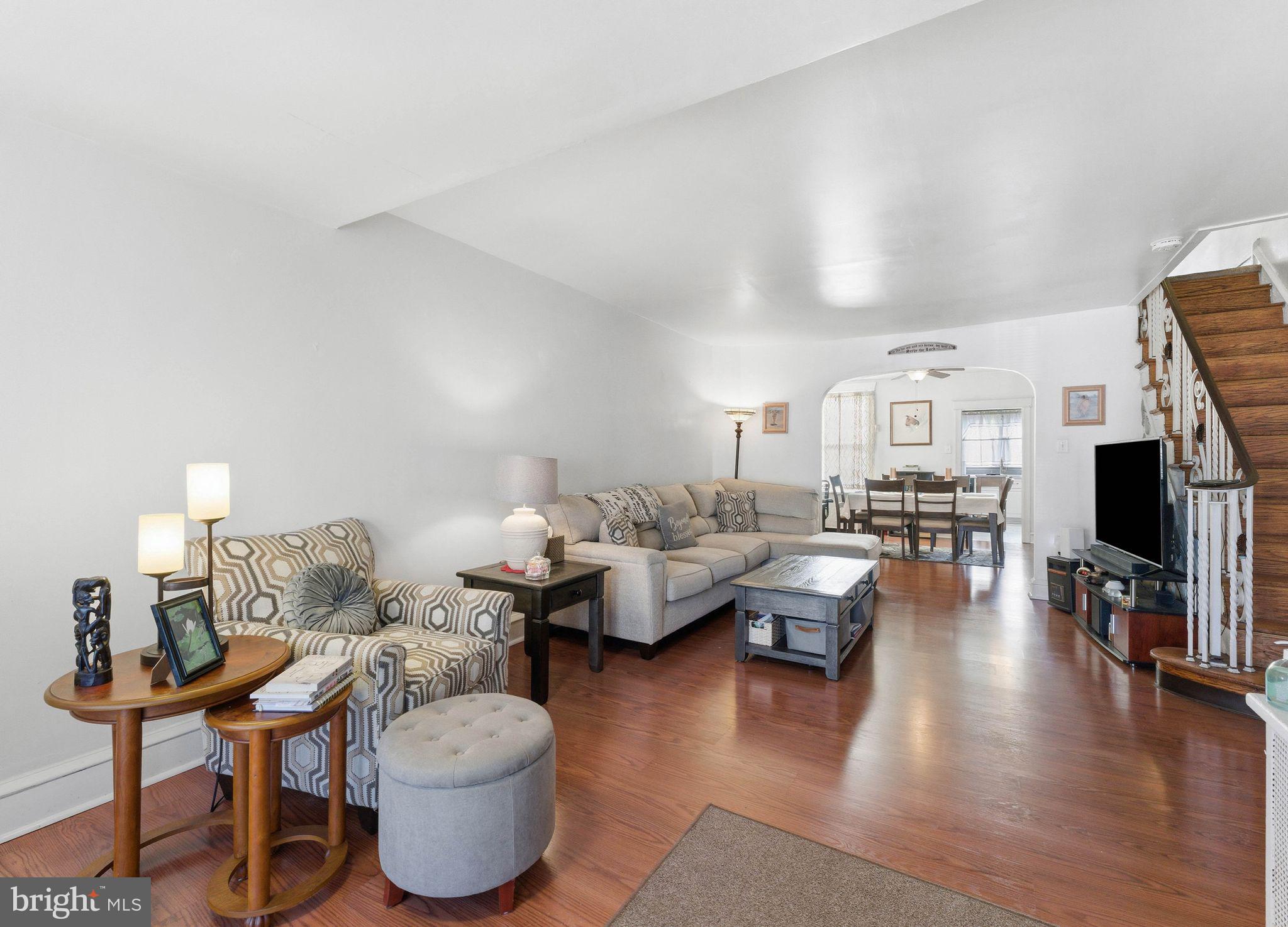 7828 Michener Avenue Philadelphia, PA 19150 - Photo 4 of 23 a living room with furniture and a wooden floor