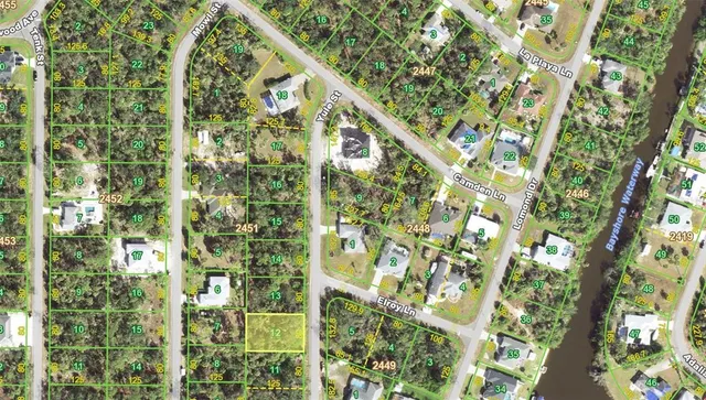 a large mirror with a plant in the background