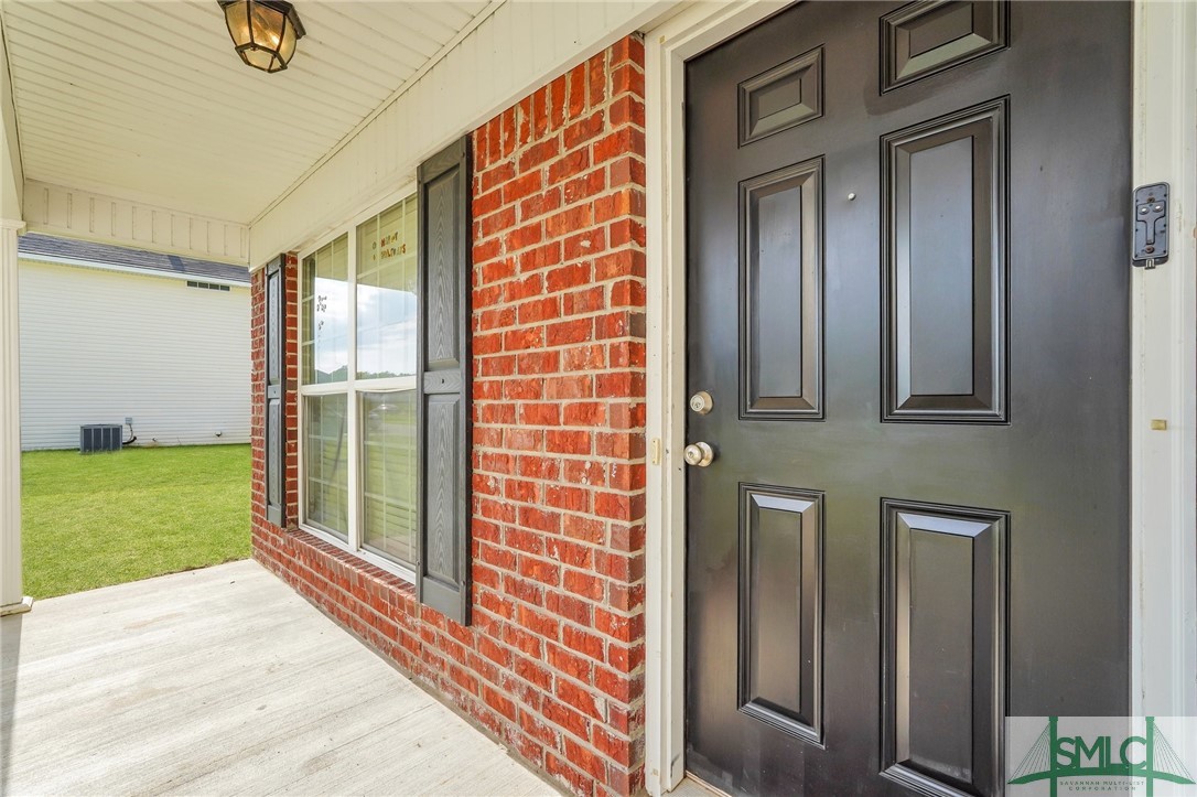 137 Whitaker Way Midway, GA 31320 - Photo 4 of 34 Front porch
