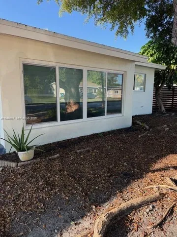 a house view with a garden space