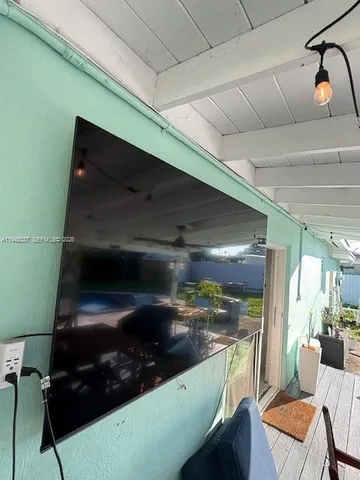 a room with chairs and window