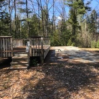 64 Medford Road Lagrange, ME 04453 - Photo 3 of 3 concrete slab and deck