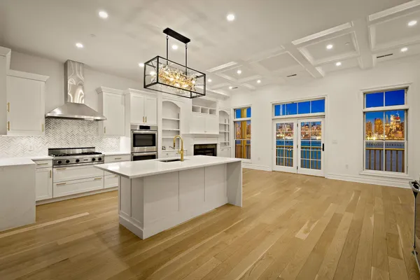 a view of kitchen with furniture and a fireplace