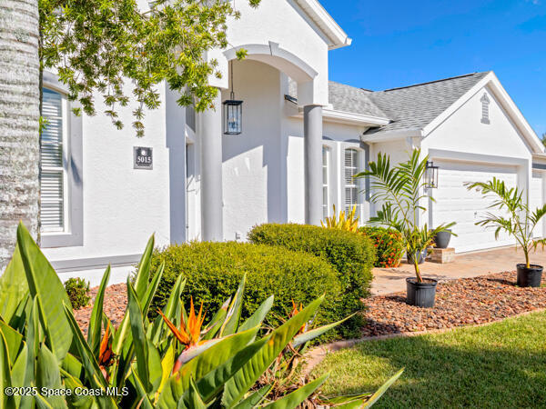 5015 Pinot Street Rockledge, FL 32955 - Photo 1 of 46 a view of an house with backyard and swimming pool