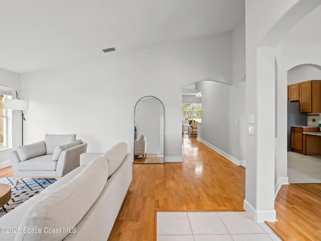 a bathroom with a toilet a sink and shower