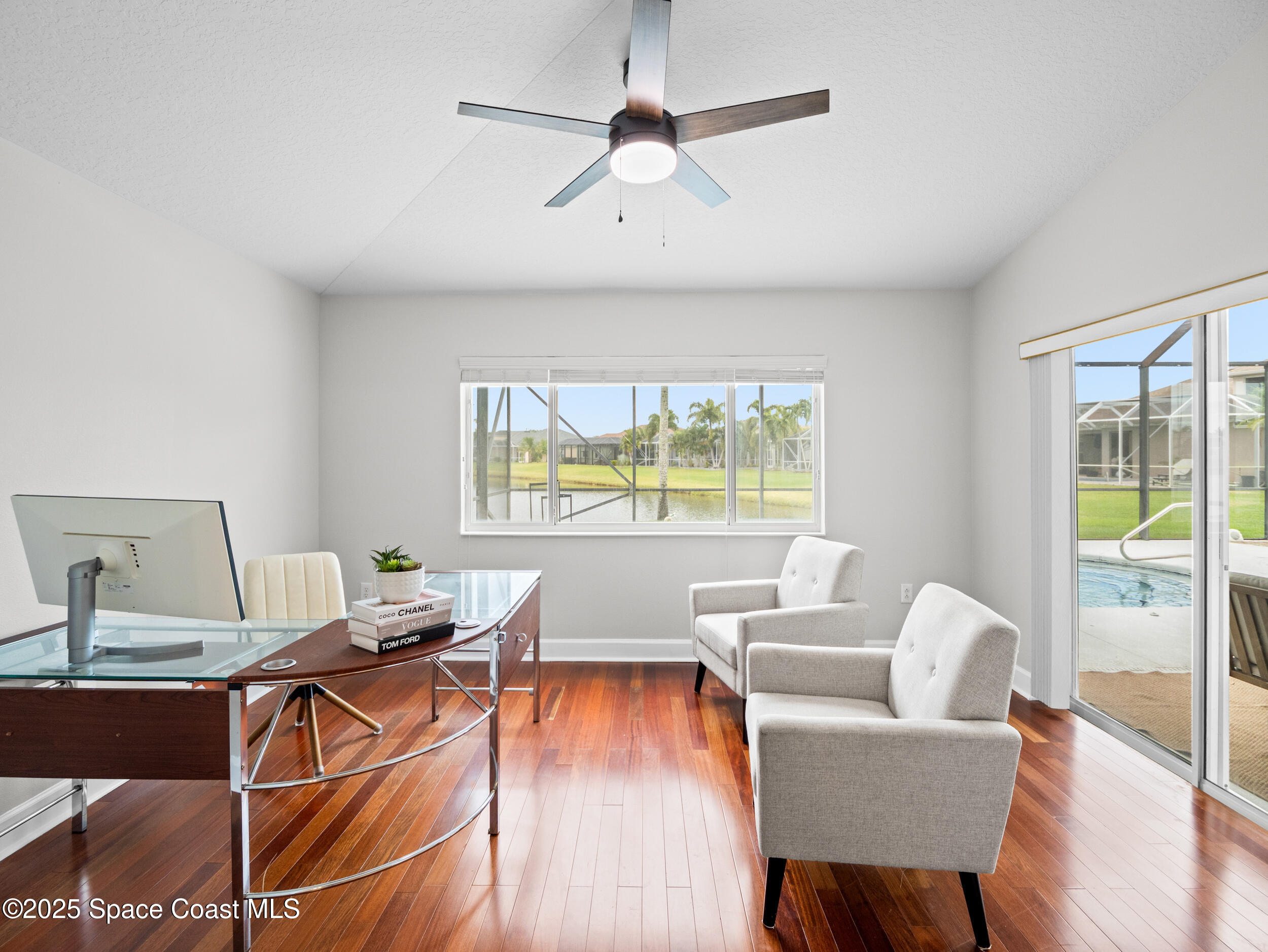 5015 Pinot Street Rockledge, FL 32955 - Photo 28 of 46 a living room with furniture and a large window