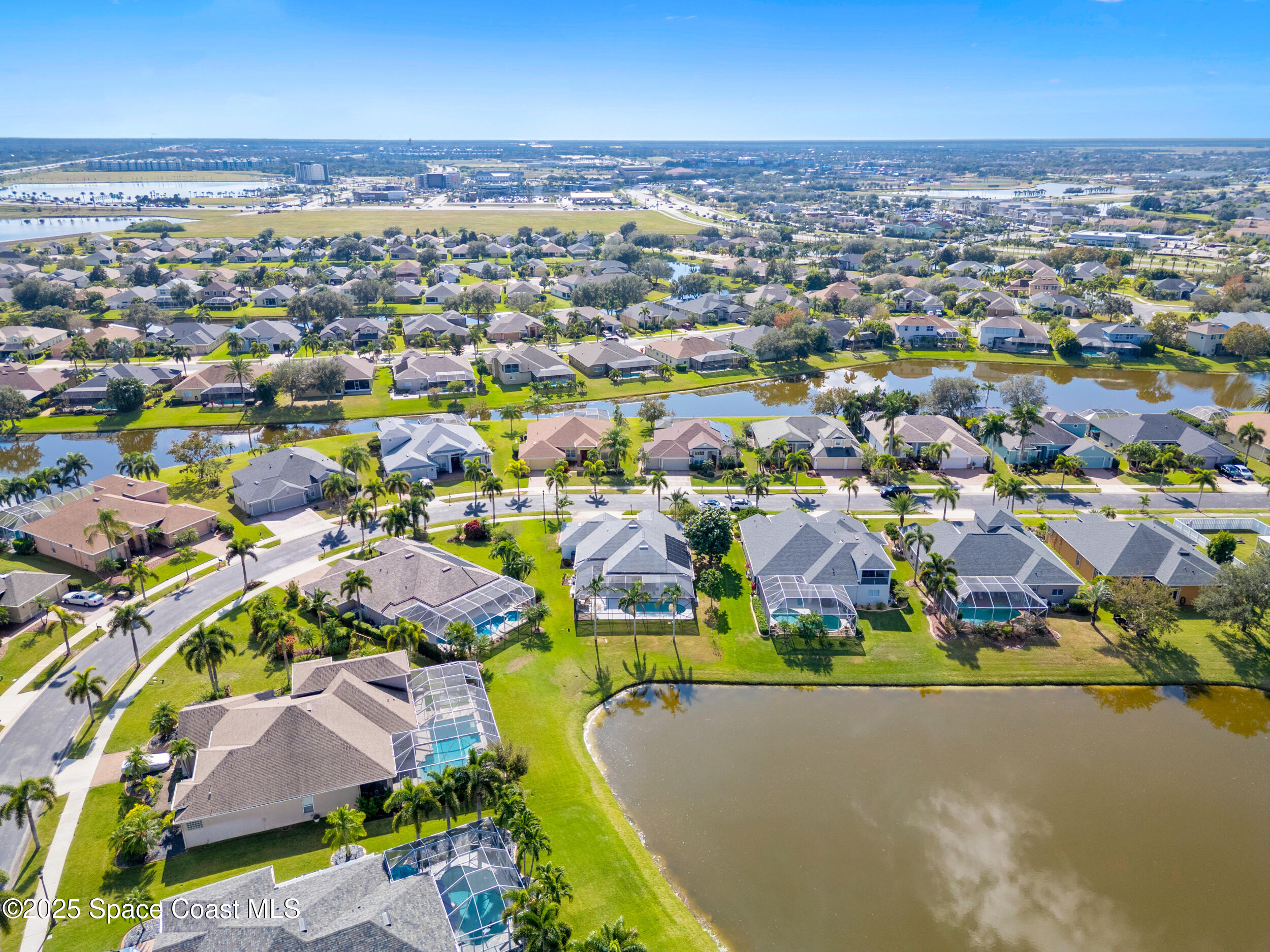 5015 Pinot Street Rockledge, FL 32955 - Photo 42 of 46 an aerial view of residential houses with outdoor space