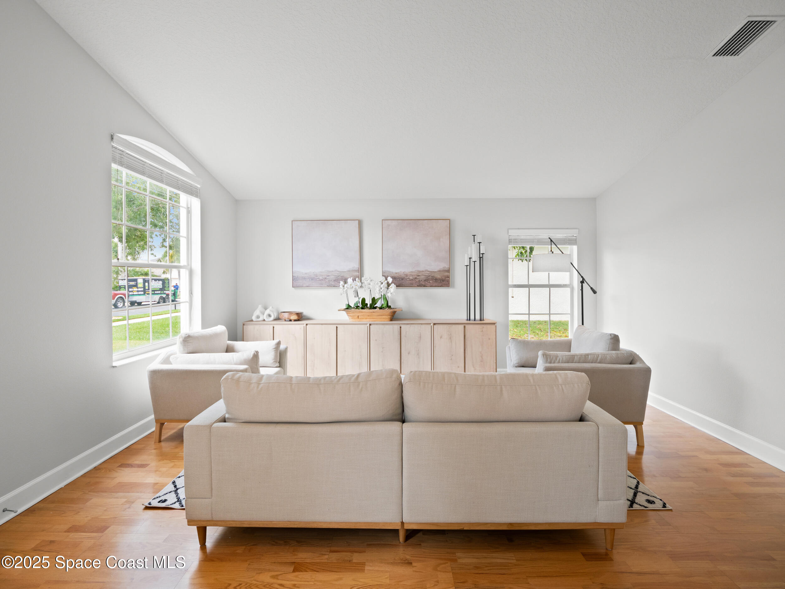 5015 Pinot Street Rockledge, FL 32955 - Photo 6 of 46 a living room with furniture and a window