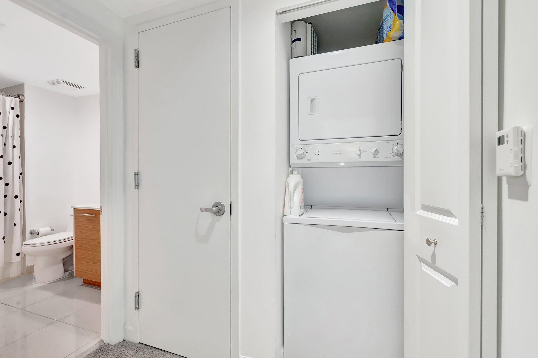 480 Hibiscus Street, Unit 709 West Palm Beach, FL 33401 - Photo 27 of 39 a utility room with dryer and washer