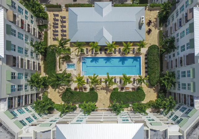 a view of swimming pool from a balcony
