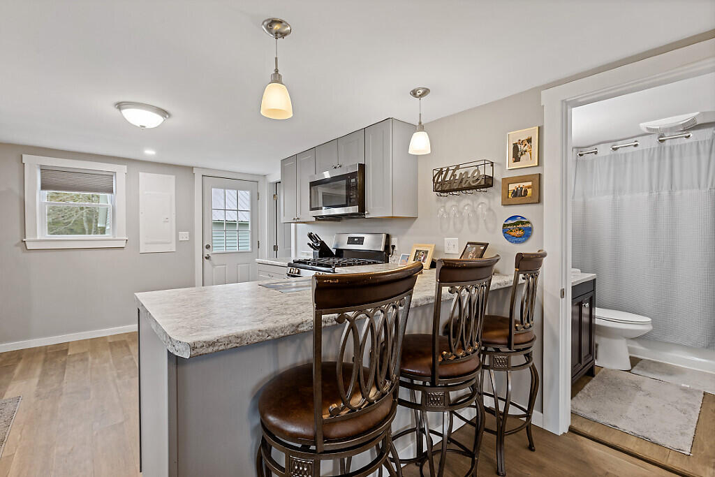 622 Waterville Road Unity, ME 04988 - Photo 11 of 19 Living Room to Kitchen