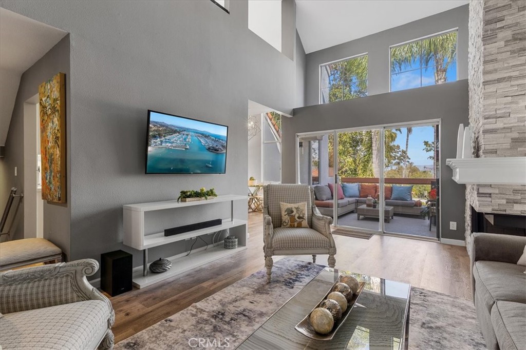 4 Logo Vista Dana Point, CA 92629 - Photo 11 of 44 a living room with furniture and a flat screen tv