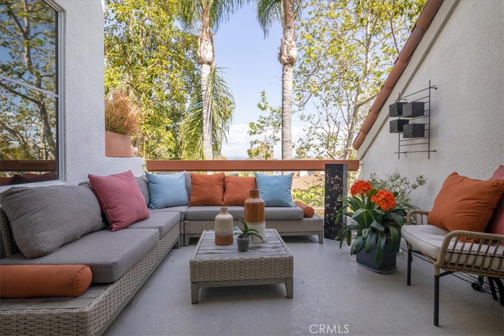 4 Logo Vista Dana Point, CA 92629 - Photo 12 of 44 a outdoor living space with furniture and a potted plant