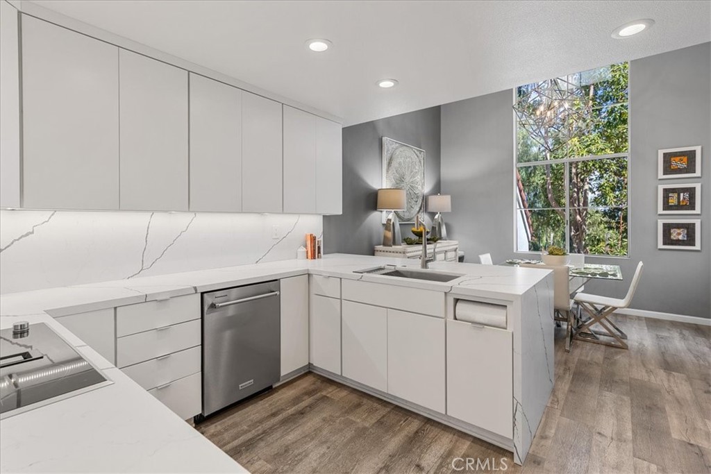 4 Logo Vista Dana Point, CA 92629 - Photo 18 of 44 a kitchen with a sink cabinets and window