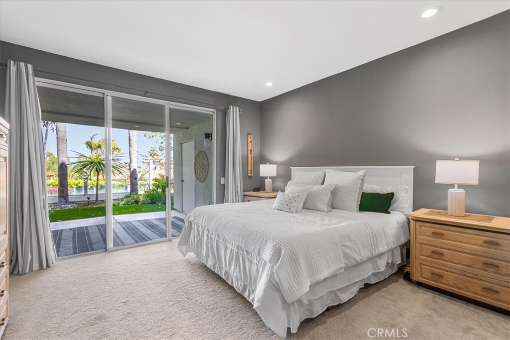 4 Logo Vista Dana Point, CA 92629 - Photo 21 of 44 a bedroom with a bed and a balcony view