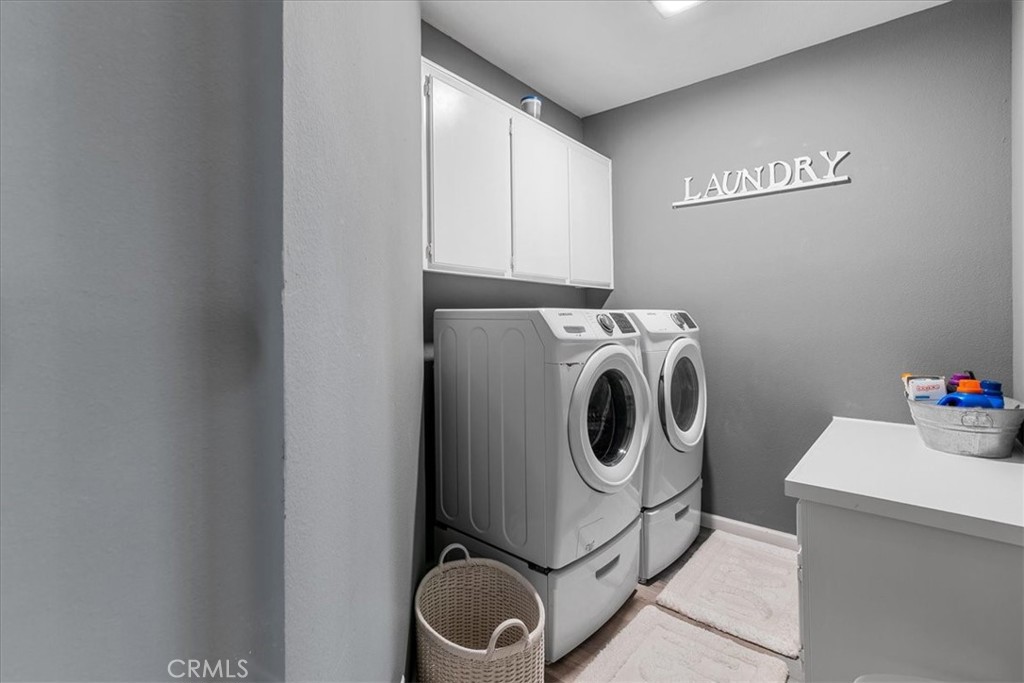 4 Logo Vista Dana Point, CA 92629 - Photo 32 of 44 a utility room with dryer and washer