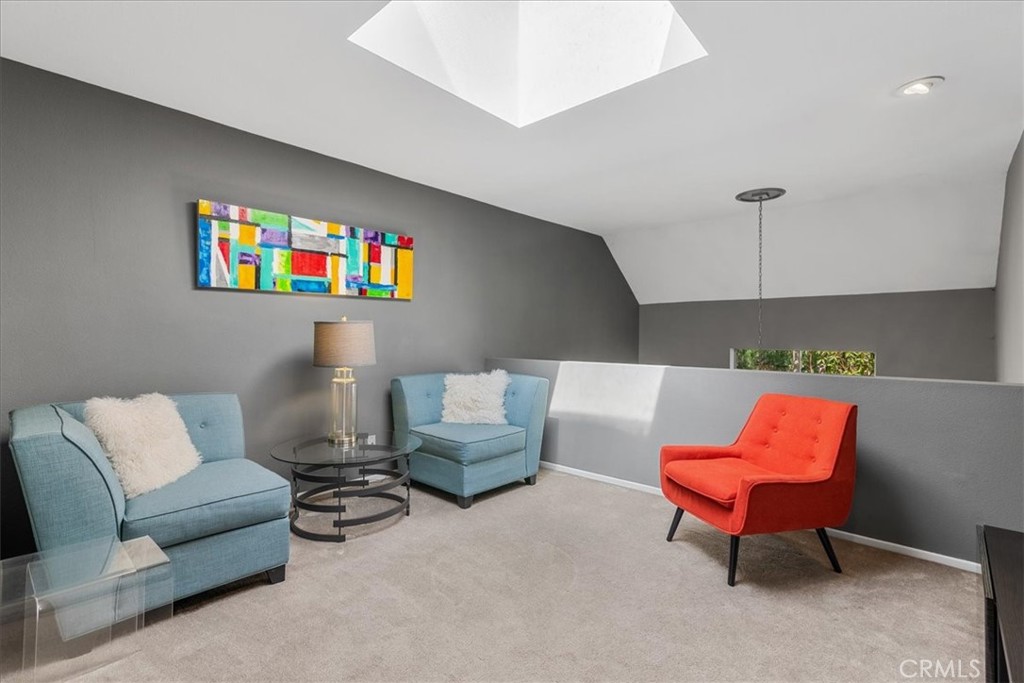 4 Logo Vista Dana Point, CA 92629 - Photo 38 of 44 a living room with furniture and a rug