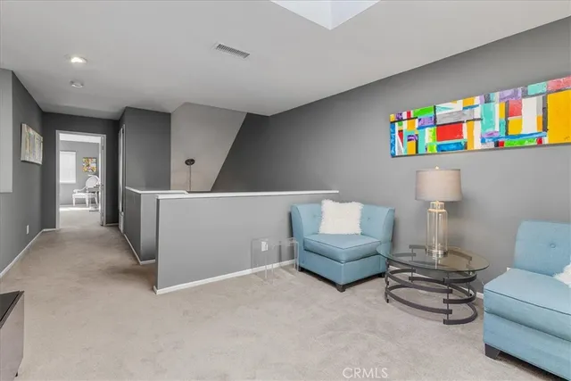 a living room with furniture and a couch