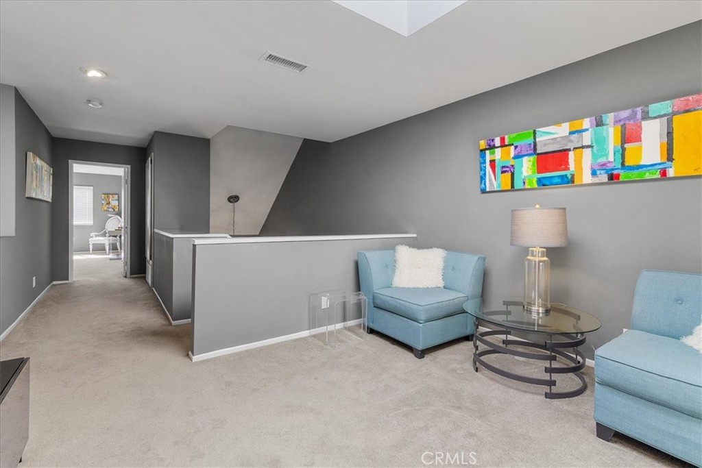 4 Logo Vista Dana Point, CA 92629 - Photo 39 of 44 a living room with furniture and a couch