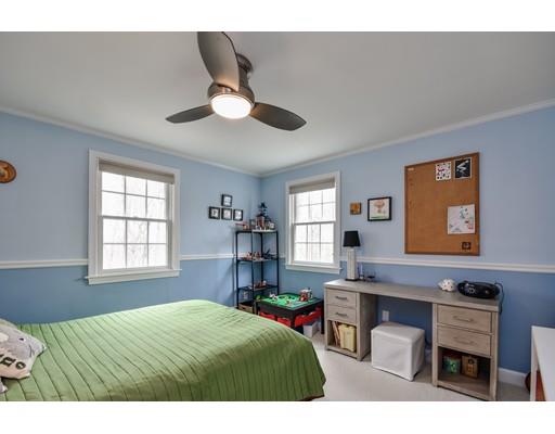 897 Salem End Road Framingham, MA 01702 - Photo 14 of 27 a bedroom with a bed window and a desk