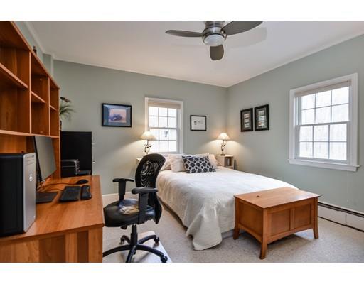 897 Salem End Road Framingham, MA 01702 - Photo 21 of 27 a bedroom with a bed wooden floor and window
