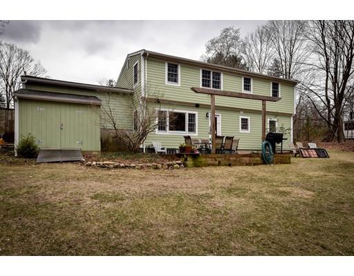 897 Salem End Road Framingham, MA 01702 - Photo 24 of 27 a front view of a house with a yard