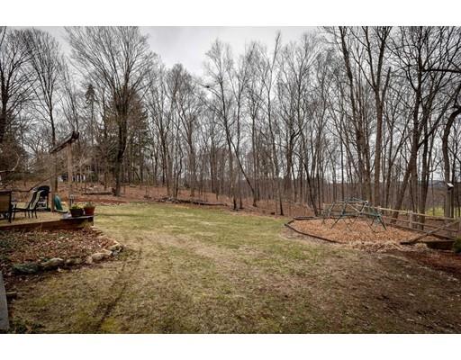 897 Salem End Road Framingham, MA 01702 - Photo 26 of 27 a backyard of a house with trees